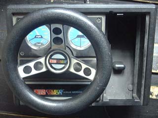 Le volant, fourni avec le jeu Turbo de Sega.